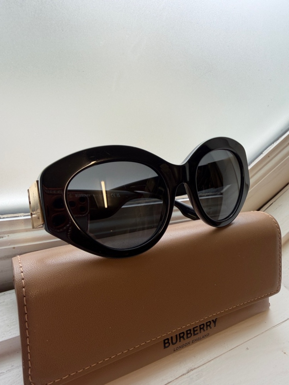 Burberry Black Oversized Round Sunglasses with Gold Temple Accents